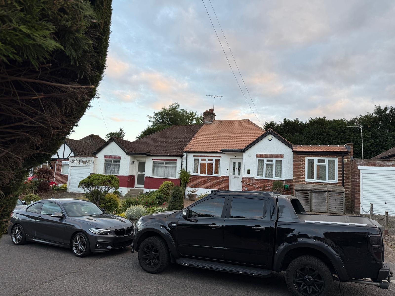 Roof cleaning and moss removal on a residential property in North West London